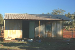 Tin sheds make do for housing in the Aboriginal community of Ampilatwatja. Not one new house has been built under the Intervention