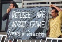 Refugees step up detention protests for freedom from infection risk