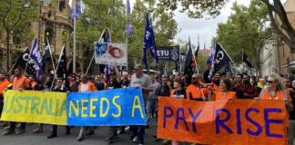 Construction workers march in their thousands