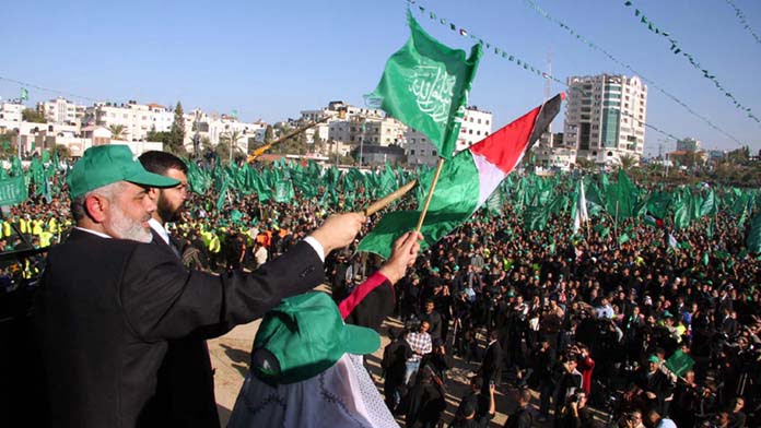 Dismissed Palestinian Prime Minister and Hamas leader Ismail Haniyeh (L) waves to supporters during a rally in Gaza on December 15, 2007. Hundreds of thousands attended the Hamas rally to mark its 20th anniversary. (UPI Photo/Mohamed Alostaz/Palestinian P