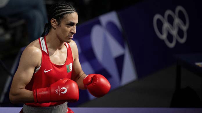 Paris, France. 01st Aug, 2024. Algeria's Imane Khelif (in red) during their women's 66kg preliminaries round of 16 boxing match during the Paris 2024 Olympic Games at the North Paris Arena, in Villepinte on August 1, 2024. Photo by Eliot Blondet/ABACAPRES