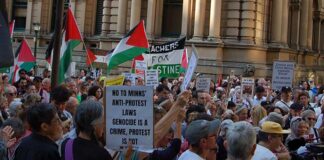 Hundreds rally to defy NSW protest ban and say no to Herzog visit