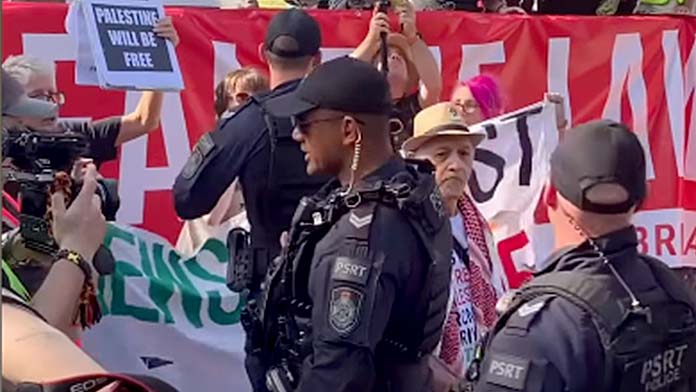 Twenty arrested in Brisbane as activists defy ban on Palestine protest slogans