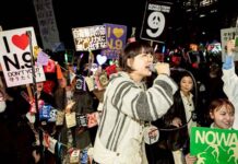 Protests as Japan boosts military to back the US against China