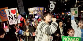 Protests as Japan boosts military to back the US against China
