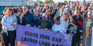 Hundreds descend on Pine Gap to expose base’s role in genocide