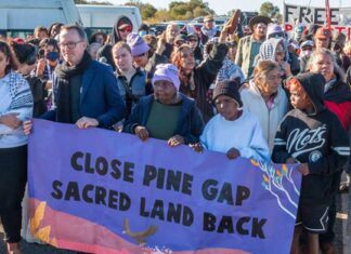 Hundreds descend on Pine Gap to expose base’s role in genocide